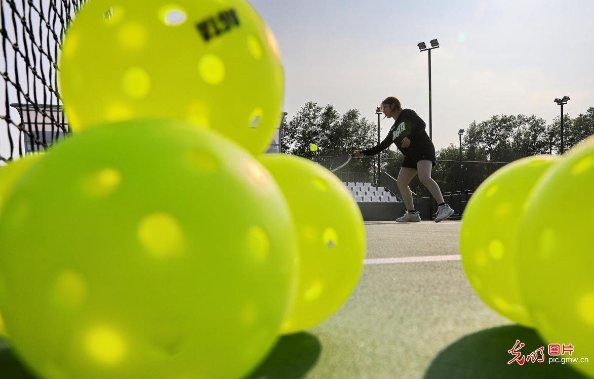 Children play pickleball during summer break